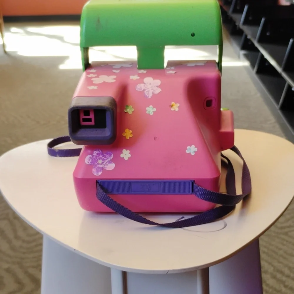 90s polaroid Barbie's camera